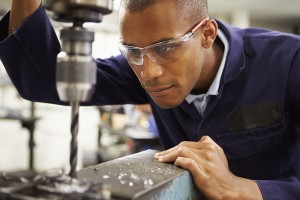 Industrial Maintenance Technician Assessment Program - Photo of Student using a drill press.