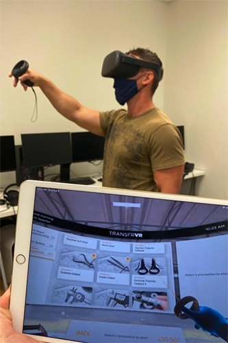 Photo of student using VR headset